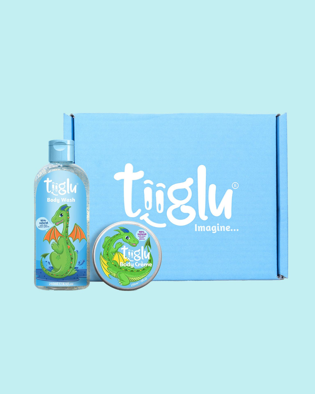 Tiiglu® Dragon Scales Gift Set: A fruity bubblegum duo for kids featuring a playful dragon—Dragon Body Wash (95% natural) and Body Crème (98% natural). Vegan, cruelty-free, in eco-friendly packaging, presented in a blue Tiiglu® gift box.