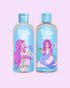 Tiiglu® Kids Mermaid Glimmer Set with Shampoo (95% natural) and Body Wash (95% natural), each 250ml, featuring a pink-haired mermaid on light blue labels, jumping jelly beans-scented, on a light pink background.