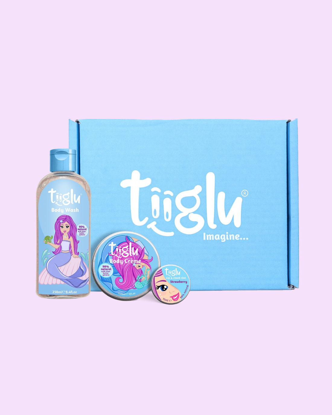 Tiiglu® Mermaid Glow Gift Set: A magical trio for kids featuring a pink-haired mermaid—Mermaid Body Wash (95% natural), Body Crème (98% natural), and strawberry pink Lip &amp; Cheek Tint (98% natural). Vegan, cruelty-free, in eco-friendly packaging, presented in a blue Tiiglu® gift box.