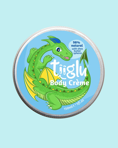 Tiiglu® Kids Dragon Body Crème lid (150ml), with a green dragon on a light blue background, &